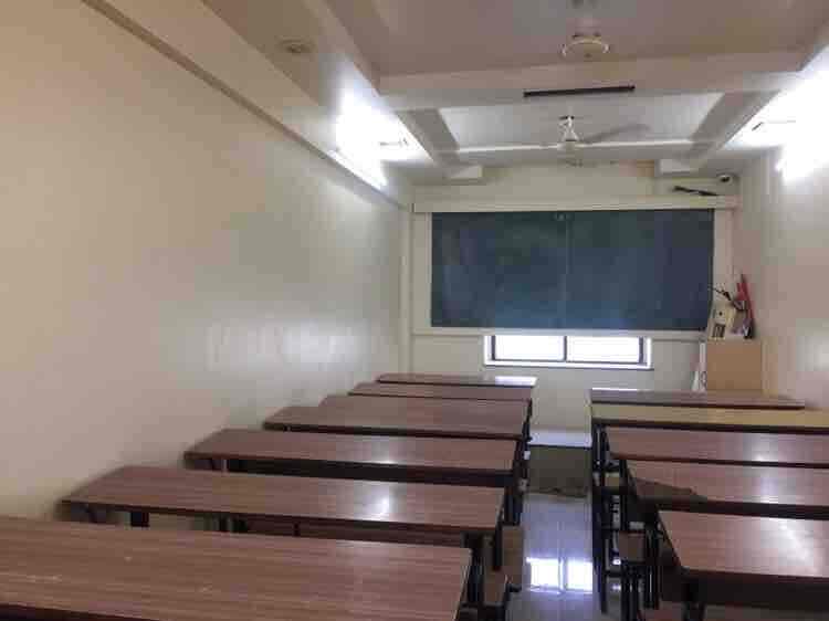 Well-furnished classroom with student desks