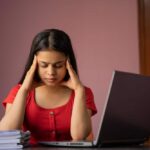 Parent supporting a stressed student after low prelim exam scores before HSC board exams